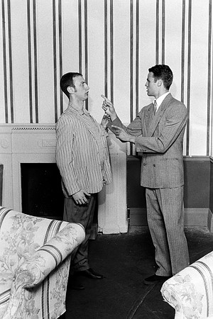 Two male actors arguing.