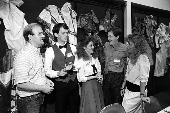 Participants of Playmill reunion talking.