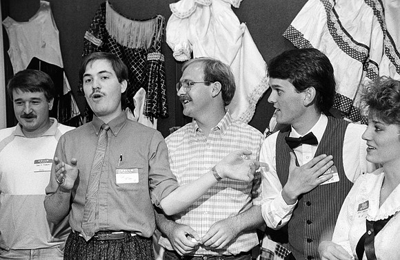 Participants of Playmill reunion talking.