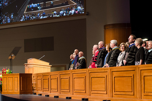 Faculty, along with Elder Maynes and President Kim B. Clark wait for the BYU-I Winter 2014 Semester Graduation Commencement ceremony to begin.