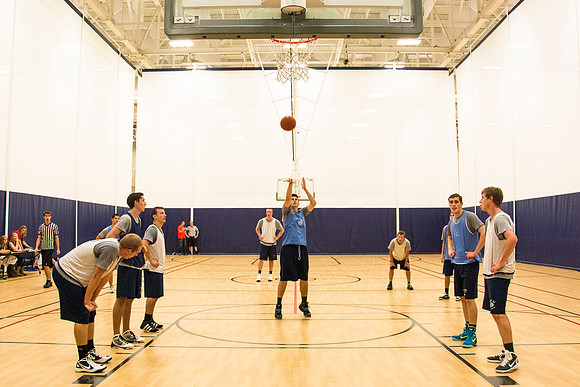 Students play ward basketball in the I-Center