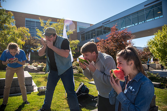 Students participate in a watermelon eating contest during Spirit week on, Fall Semester.