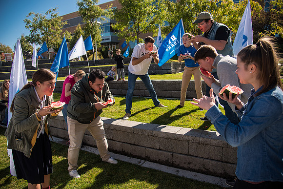 Students participate in a watermelon eating contest during Spirit week on, Fall Semester.