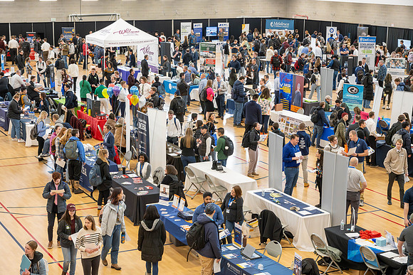 Students gather in the I-Center courts at the 2024 Winter Career fair.