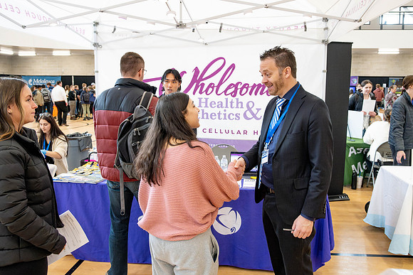 Students gather in the I-Center courts at the 2024 Winter Career fair.