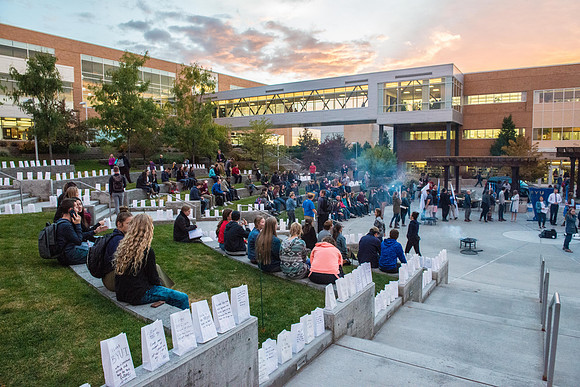 The Torch lighting ceremony held in the amphitheater court, Fall semester.