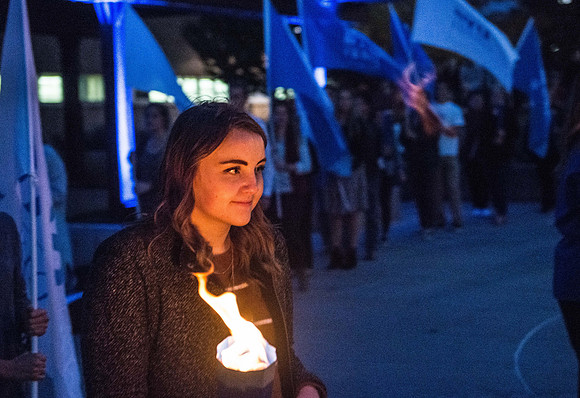 The Torch lighting ceremony held in the amphitheater court, Fall semester.