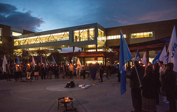 The Torch lighting ceremony held in the amphitheater court, Fall semester.