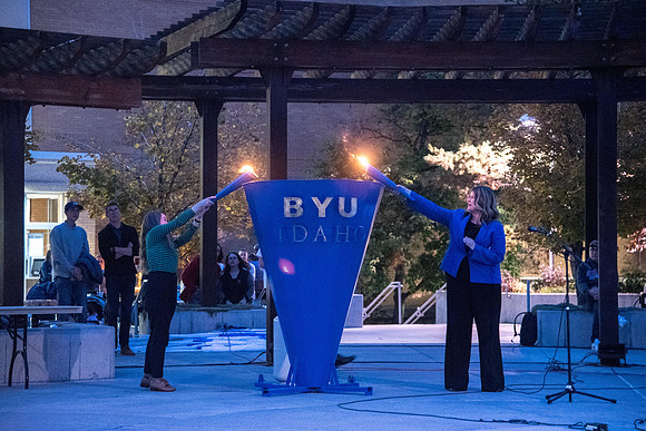 Lighting the BYUI Spirit Week cauldron, luminaries, free hot dogs, fire-pits with S'mores.