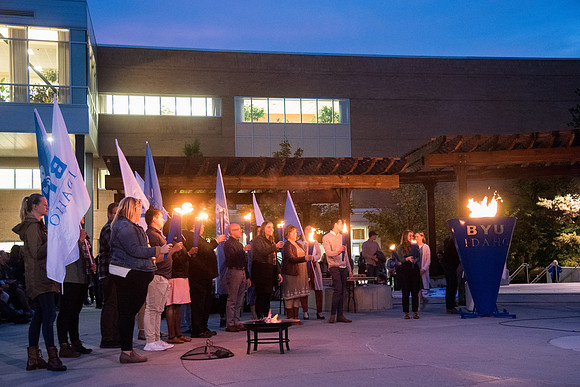 Lighting the BYUI Spirit Week cauldron, luminaries, free hot dogs, fire-pits with S'mores.