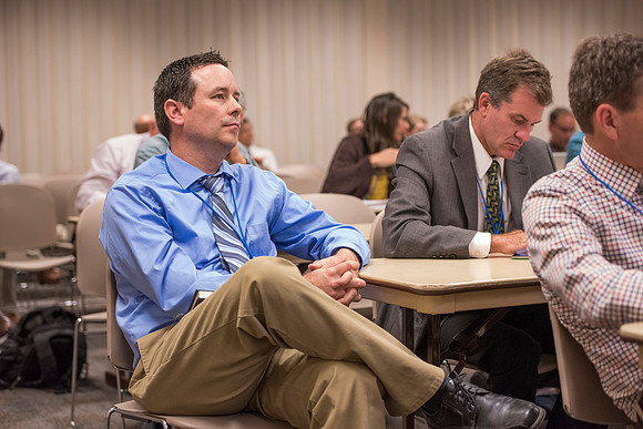 Faculty members come together in preparation of the new school year.