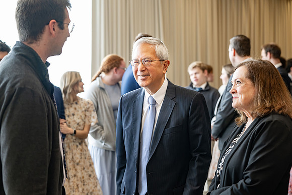 Elder and sister Gong meet with students of BYU-Idaho.
