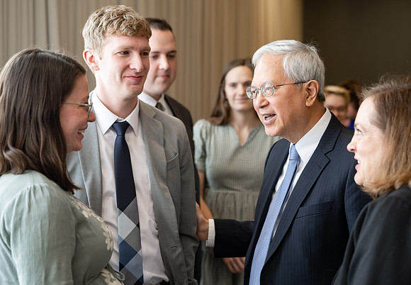Elder and sister Gong meet with students of BYU-Idaho.