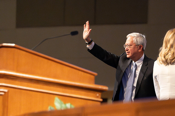 Elder and Sister Gong address BYU-Idaho students during devotional.
