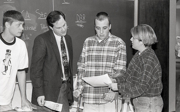 Communications students work alongside their instructor, Eric Embree.