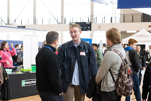 Students gather in the I-Center courts at the 2024 Winter Career fair.