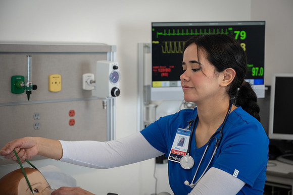 Nursing students in lab.