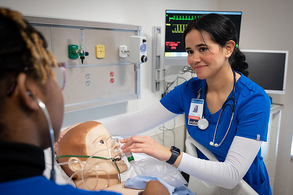 Nursing students in lab.