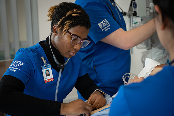 Nursing students in lab.