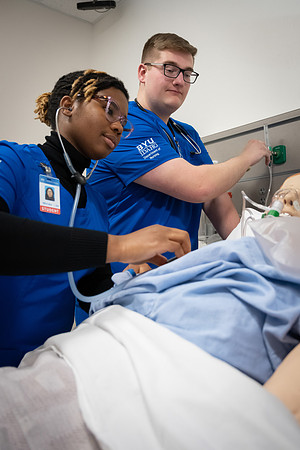 Nursing students in lab.