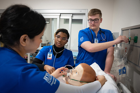 Nursing students in lab.