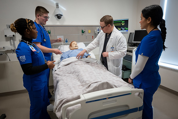 Nursing students in lab.