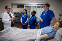 Nursing students in lab.