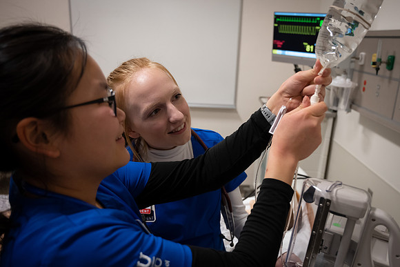 Nursing students in lab.