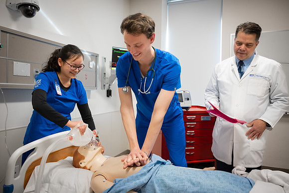 Nursing students in lab.