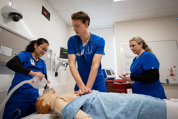 Nursing students in lab.