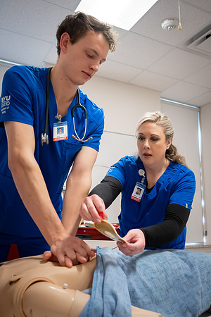 Nursing students in lab.