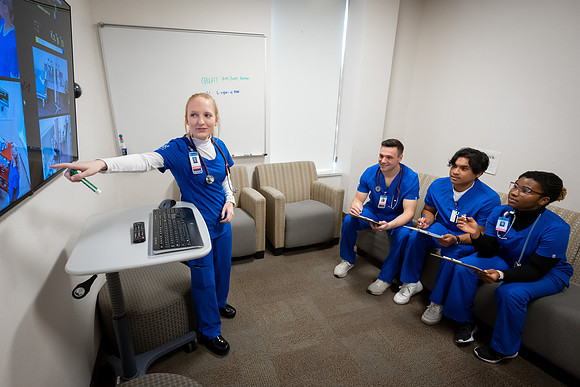 Nursing students in lab.