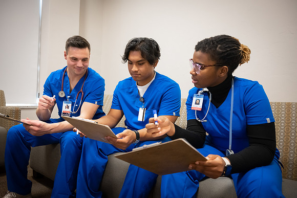 Nursing students in lab.