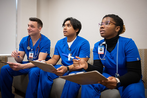 Nursing students in lab.