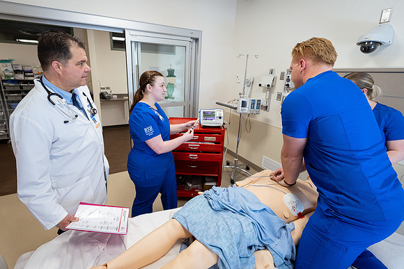 Nursing students in lab.