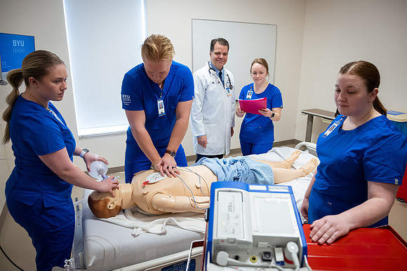 Nursing students in lab.