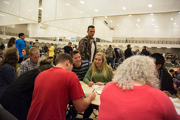 Students do a variety of service activies together with their dates.