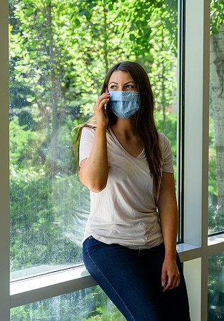 Student volunteers show the way to stay safe during this COVID 19 pandemic by social distancing, following pathway arrows and proper wearing of masks .