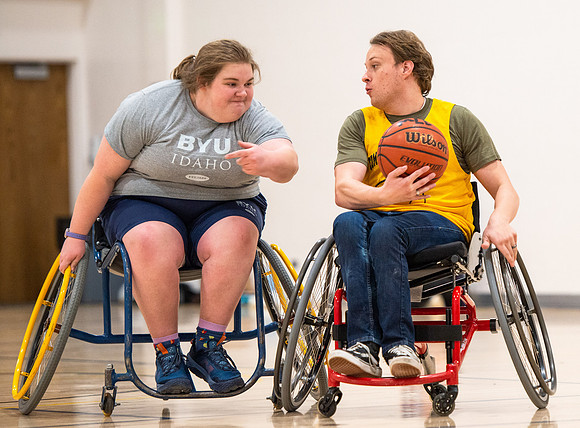 Students participate of Wheelchair Basketball in the Hart Gym.