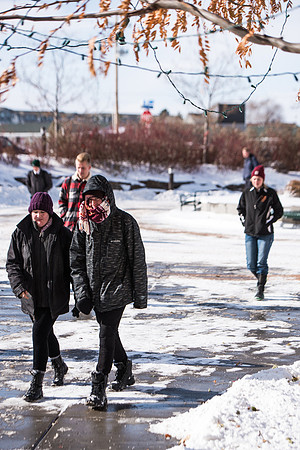 Students walking into devotional in the snow, Fall Semester.