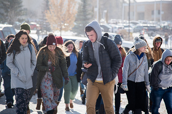 Students on their way to devotional on a frozen fall day.