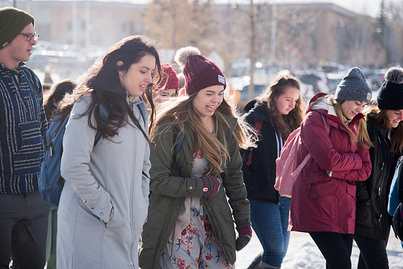Students on their way to devotional on a frozen fall day.
