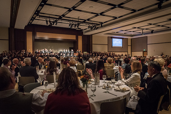 A choir performs a special musical number at the banquet.