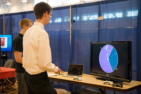 Students present their projects for the Student Research and Creative Works Conference.