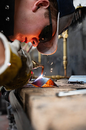 Students working in the welding lab.