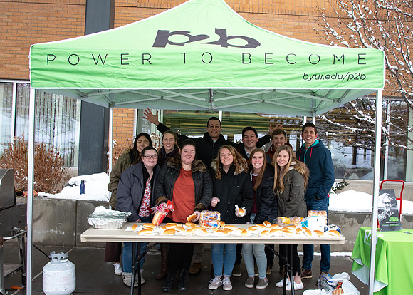 Power to Become council gives away free hotdogs to students to help get them excited to go to the P2B event.