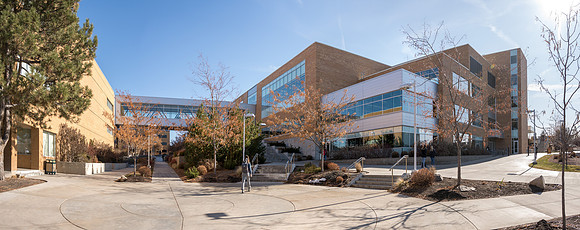 A beautiful Autumn day. The Manwaring Center and the McKay Library, connected by a skywalk.
