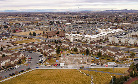 Aerial view of University Village, BYU-Idaho's Married student housing with the Community Center under construction.