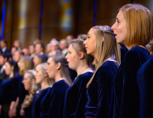 The men's and women's combined choir perform during devotional held in the BYU-Idaho Center, Fall Semester.