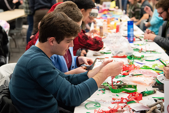 Students decorating cards at the MC
